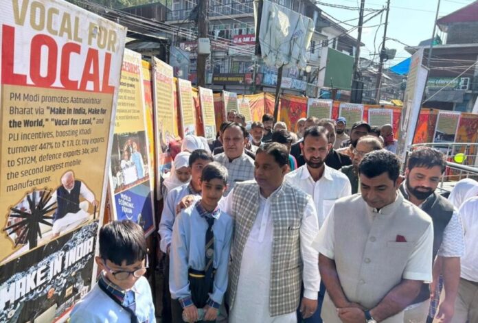 Sat Sharma addressing a crowd during Namo Exhibition event in Bandipora